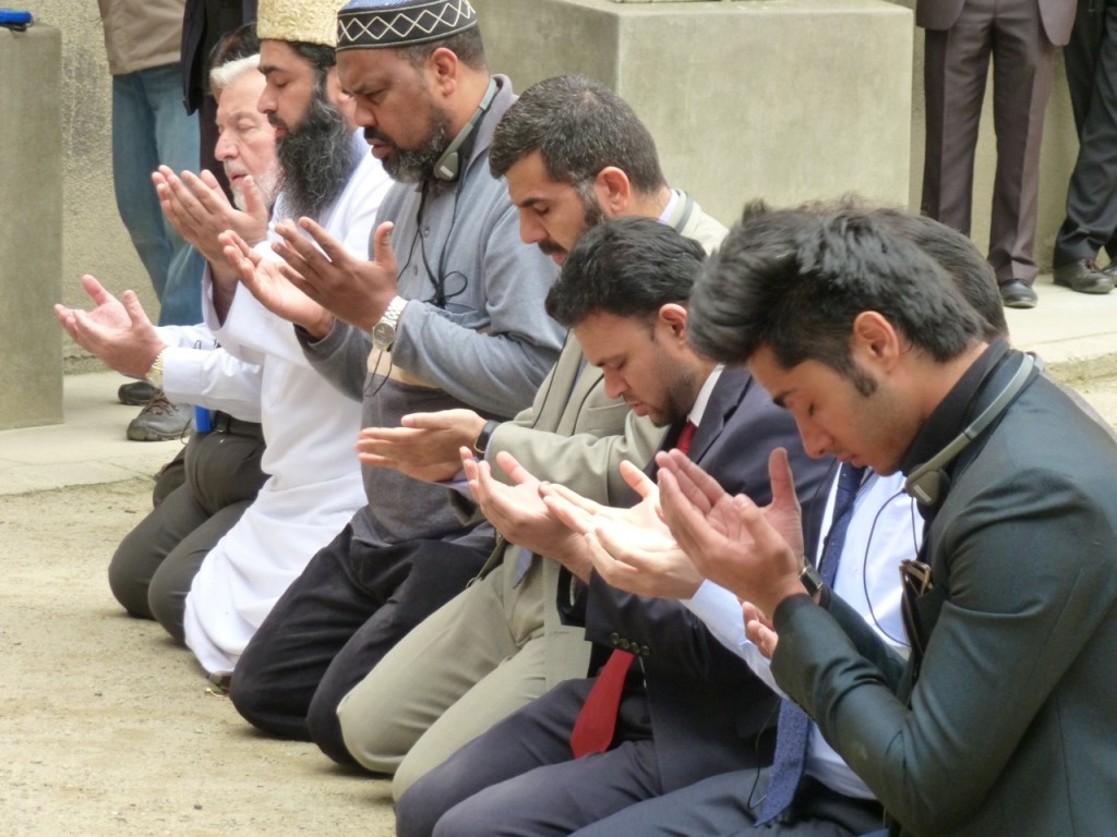 The Muslim delegation in prayer at the infamous &quot;Wall of Death&quot; at Auschwitz where prisoners were routinely shot to increase fear in others. (photo: Susan Barnett)